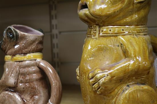 Two Continental pottery jugs, modelled as seated pugs, late 19th century, 25.5cm